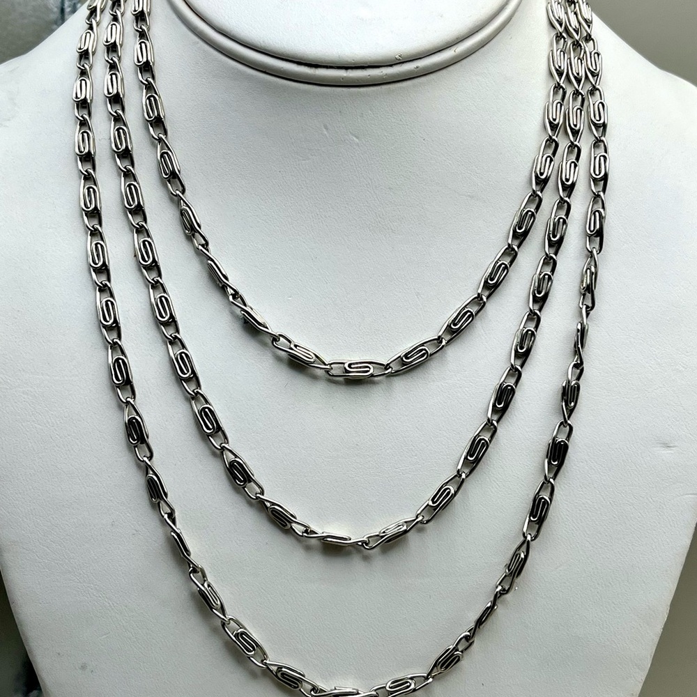 Holiday Sparkle: Triple-Coiled Silver Toned Long Chain -Layered Statement